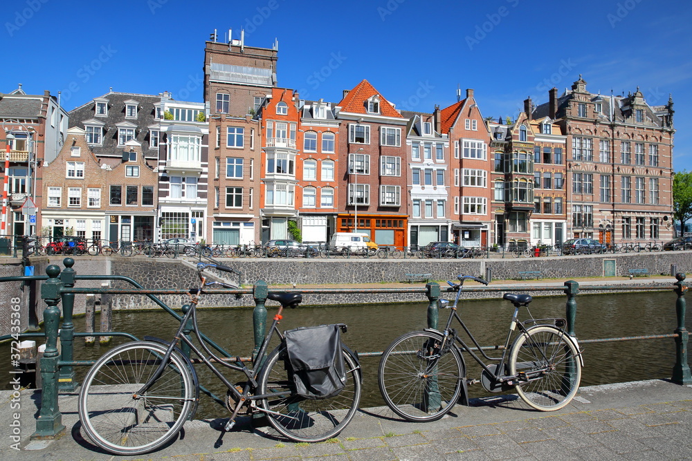 Kadijksplein, with crooked heritage buildings and bicycles in the foreground, located in Amsterdam Centrum, Amsterdam, Netherlands