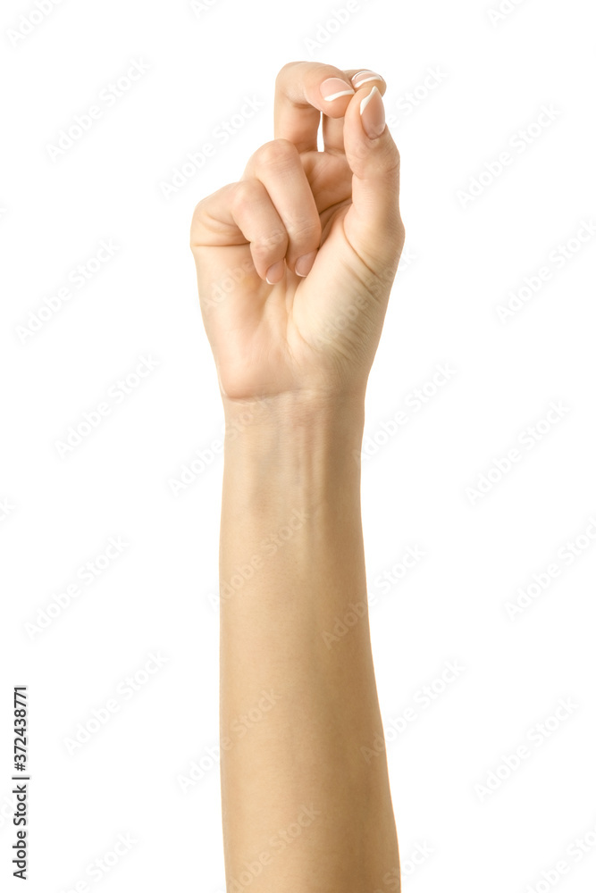 Sign of the cross made with three fingers. Woman hand gesturing isolated on white Sign of the cross made with three fingers. Woman hand gesturing isolated on white