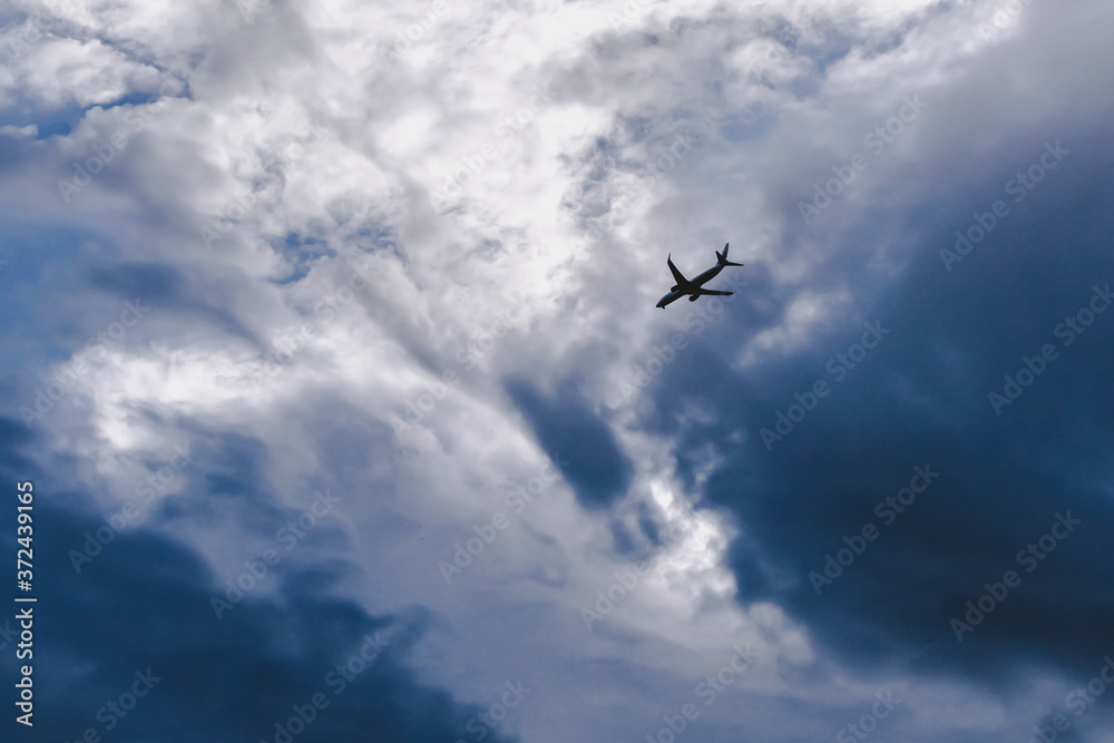 airplane flying dark blue white cloudy background airplane flying dark blue white cloudy background