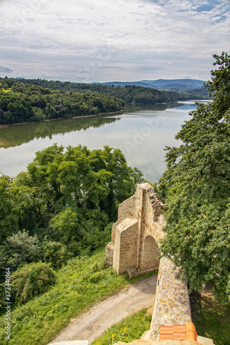 historic defensive wall of a stone castle in Poland in Dobczyce on a summer day overlooking the lake