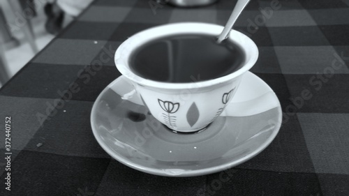 Ethiopian traditional cup of coffee on a table