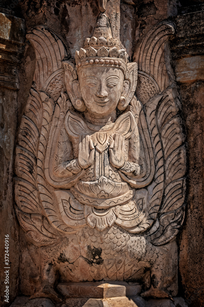 Detail of a nat statue (angel of spirit) in Tharkhaung buddhist monastery near Inle lake in Burma, Myanmar