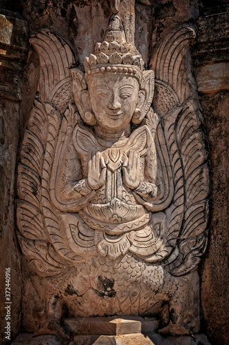 Detail of a nat statue (angel of spirit) in Tharkhaung buddhist monastery near Inle lake in Burma, Myanmar © Delphotostock