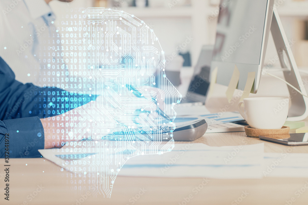 Businessman with computer background with brain theme hologram. Concept of brainstorm. Multi exposure. Businessman with computer background with brain theme hologram. Concept of brainstorm. Multi exposure.