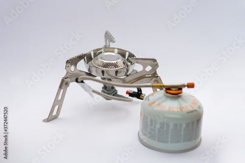 portable gas stove for cooking. Hiking, camping equipment. bushcraft and survival concept