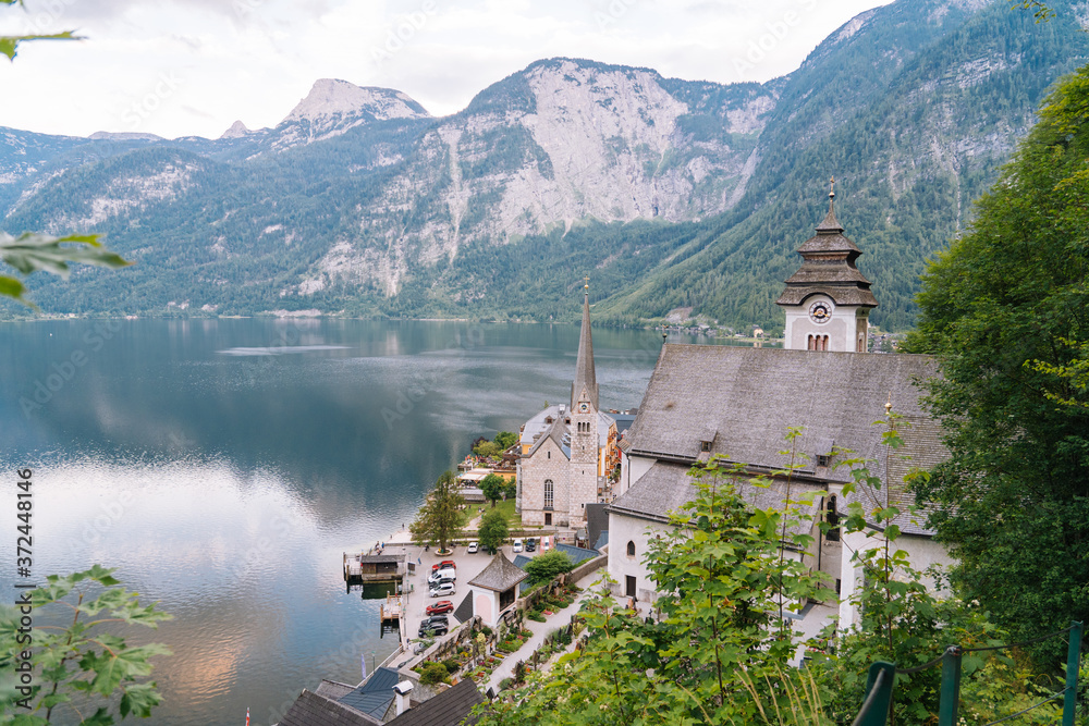 Austria, Hallstatt UNESCO historical village. Scenic picture-postcard view of famous mountain village in Austrian Alps in Salzkammergut area at beautiful light in summer. Views over roofs of the lake.