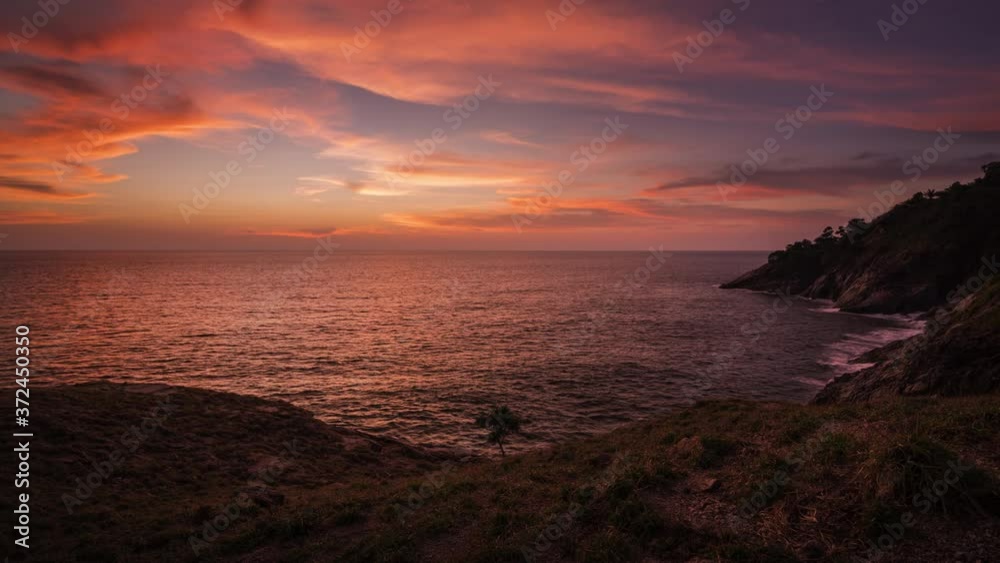 beautiful sunset on green grass coastline 4k time lapse, laem krating viewpoint at Phuket Thailand beautiful sunset on green grass coastline 4k time lapse, laem krating viewpoint at Phuket Thailand