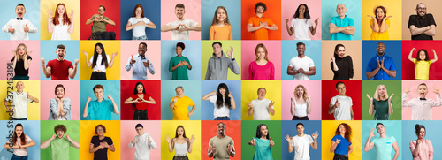 Collage of portraits of 35 young emotional people on multicolored background. Concept of human emotions  facial expression  sales. Smiling  heart gesture  thumb up  happy  celebrating  pointing