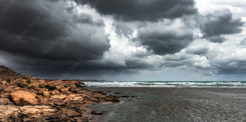 Huge thunderstorm rain dark cloud over the sea, hurricane approaching Huge thunderstorm rain dark cloud over the sea, hurricane approaching