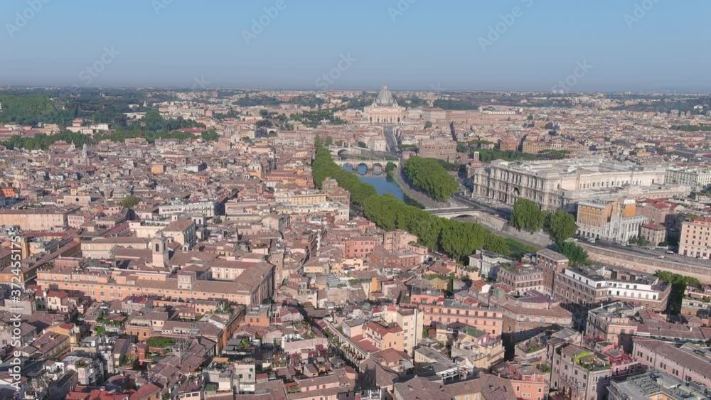 Aerial view of Rome, Castel Sant'Angelo (Castle of the Holy Angel) in foreground and Vatican City in background, bridges over river Tiber - cityscape of capital city of Italy from above, Europe Aerial view of Rome, Castel Sant'Angelo (Castle of the Holy Angel) in foreground and Vatican City in background, bridges over river Tiber - cityscape of capital city of Italy from above, Europe