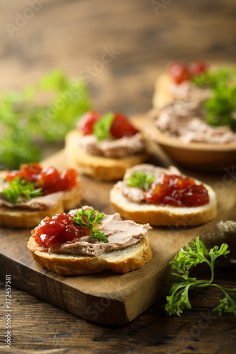 Traditional homemade pate on toast with jam