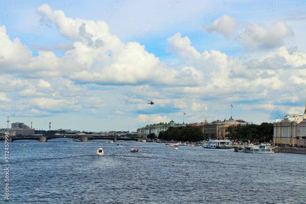 
View from the bridge to the Neva river cloudy sky