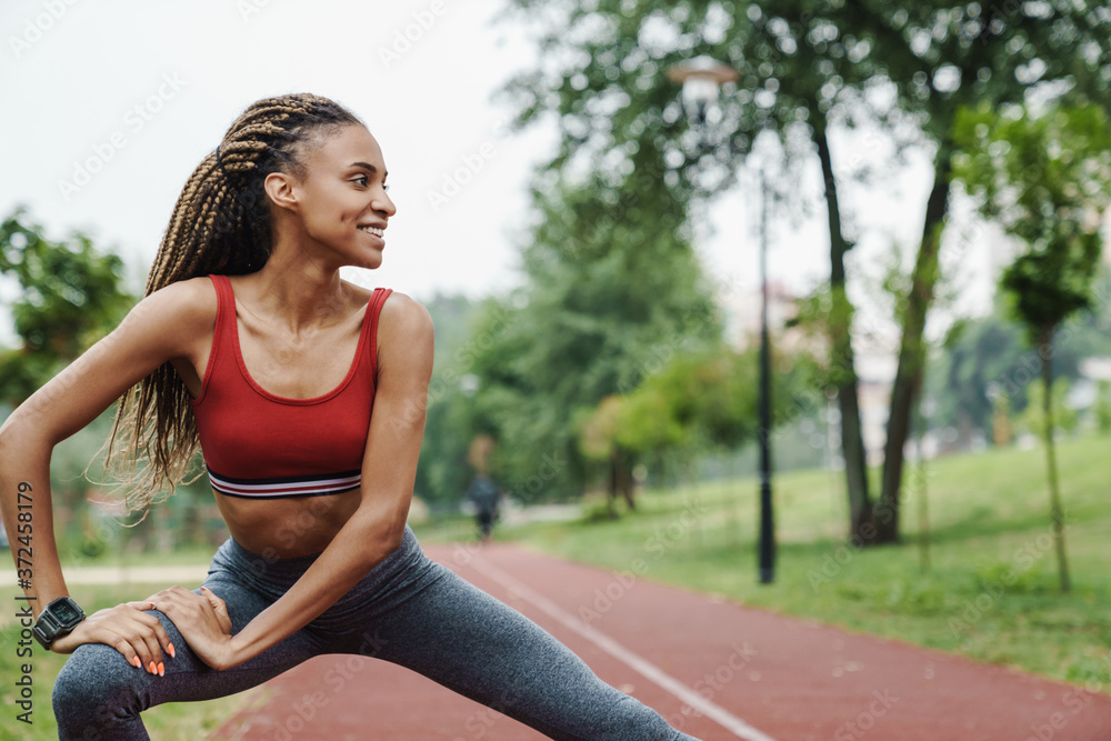 Confident fit young african sports woman Confident fit young african sports woman