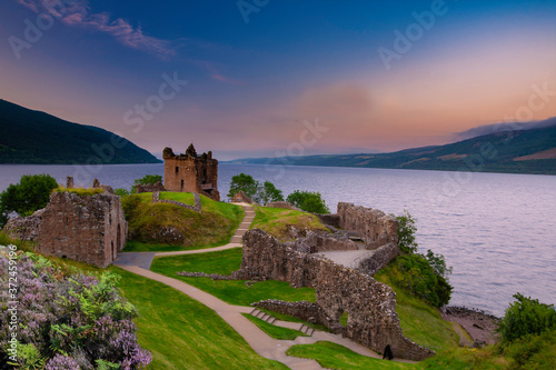 Urquhart Castle at sunset located on the banks of Loch ness  Scotland.