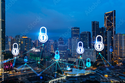 Photography Glowing Padlock hologram, night panoramic city view of Kuala Lumpur, Malaysia, Asia