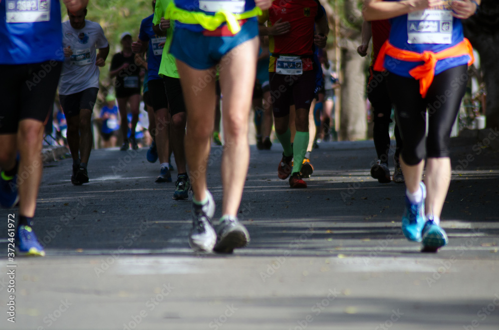 men running in marathon city shoe laces road runner men running in marathon city shoe laces road runner