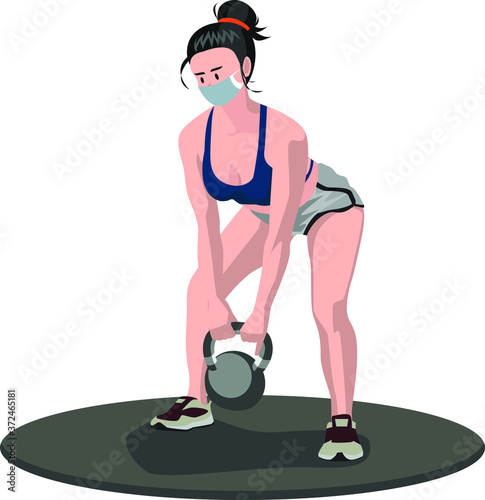 A woman with medical mask is doing weight ball fitness pose