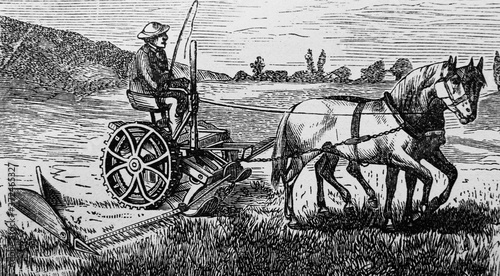 Tableau sur toile Horses harnessed to a plow in the old book Encyclopedic dictionary by A
