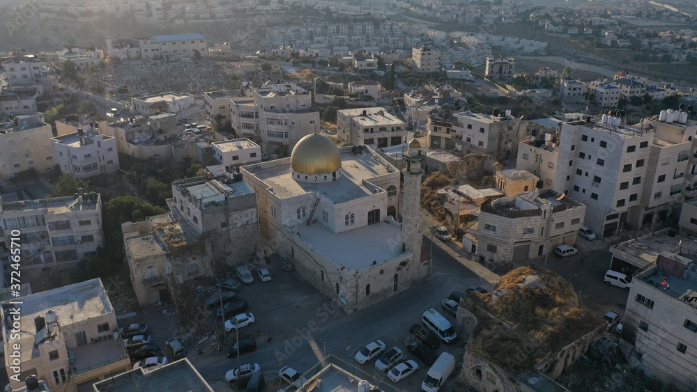 Golden Dome Mosue in Anata refugees Camp, Palestine,Israel, Aerial
Drone view, August, 2020, Sunset

