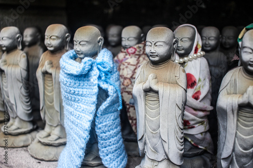 Jizo Statues at Taya Caves near Yokohama, Kanagawa Prefecture, Japan photo