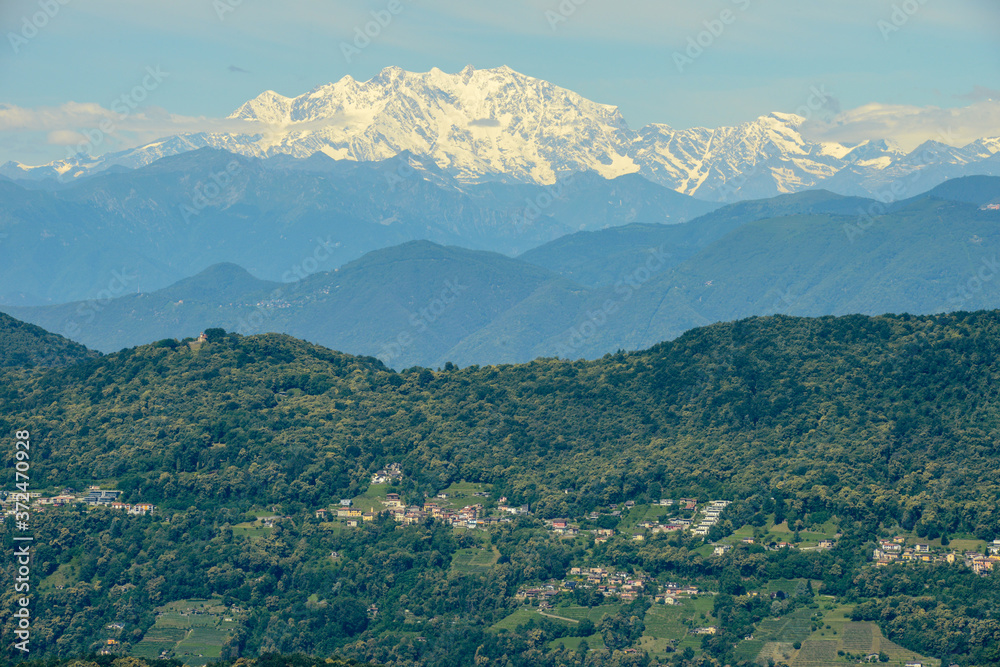 Malcantone valley with the Alps and Mount Rosa at the bottom