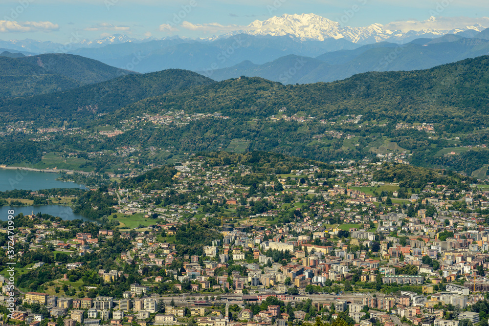 Aerial view of the center at Lugano with the Alps and Mount Rosa at the bottom
