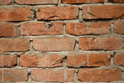 Grunge brick wall texture. Exterior, aging.Red Bricks Wall.