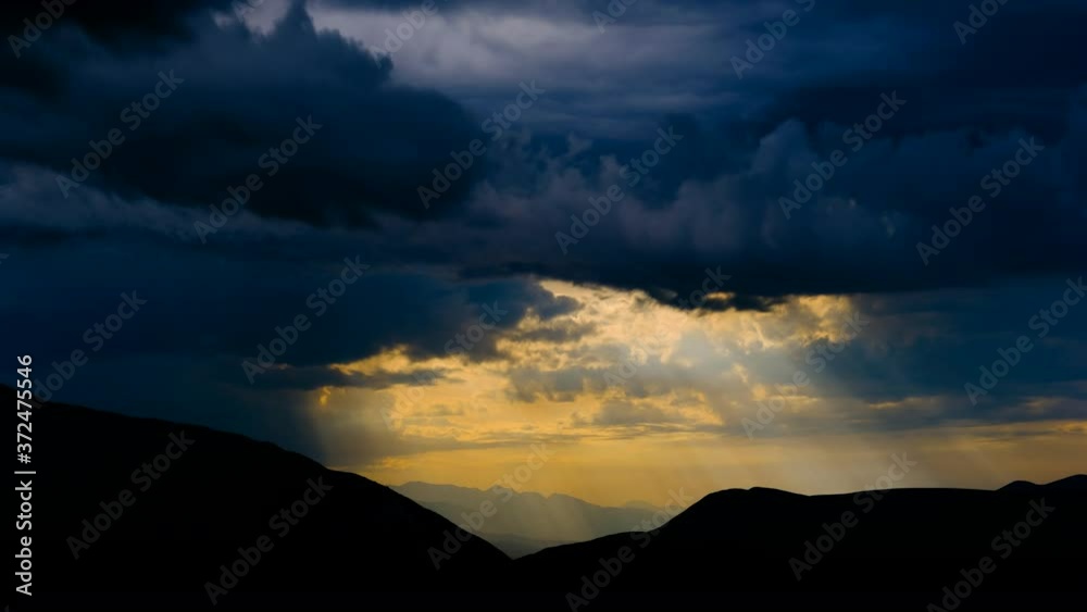 Rain and sunset over the mountains Rain and sunset over the mountains