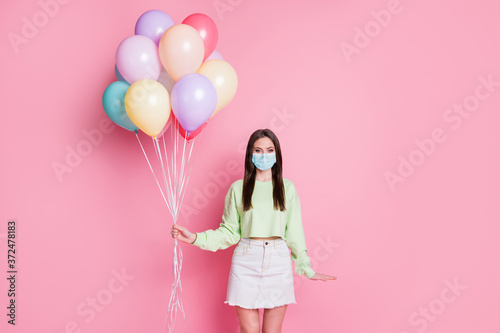 Portrait of her she attractive healthy shy straight-haired girl wear safety mask stop pandemia influenza flu mers cov grippe stay home concept preventive measures isolated pink pastel color background