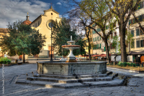 Принти на полотні the charming piazza Santo Spirito in Florence, Italy, with the little fountain i
