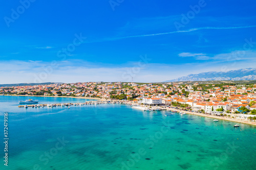 Croatia, beautiful Adriatic coastline, town of Novalja on the island of Pag, city center and marina aerial view from drone © ilijaa