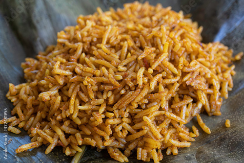 Nigerian Spicy Jollof rice served on a leaf