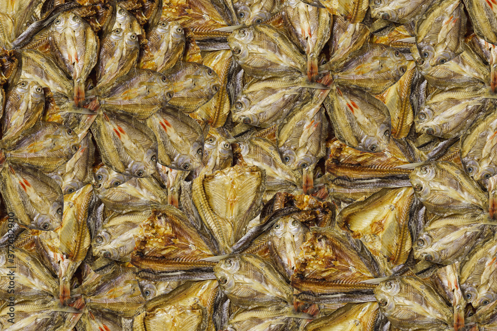 Dried fish well kept. Textured dried fish and  background.