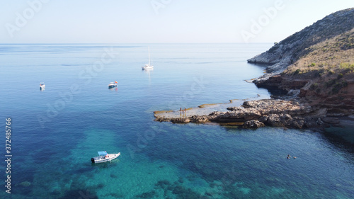 Cala Bianca, una meravigliosa spiaggia vista dall'alto, con le sue acque cristalline. photo