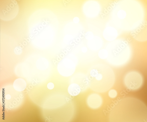 Gold glittering background with bokeh effect. Golden twinkled light backdrop for Wedding or Christmas xmas card