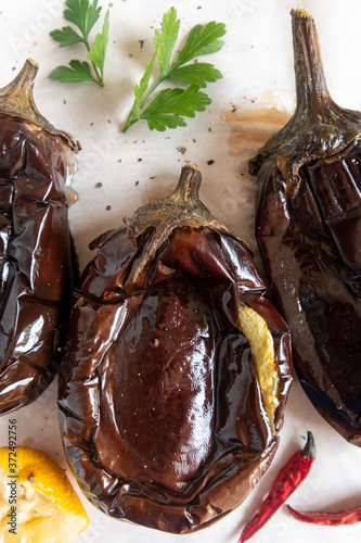 roasted aubergines with herbs and lemons  photo