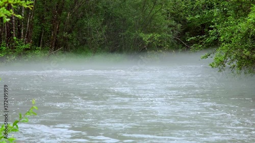 Current of a mountain full-flowing river. 4k