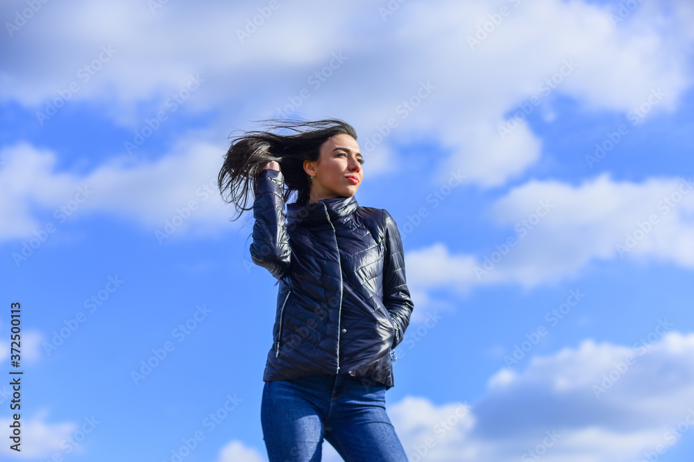 Beauty and fashion look. Feel free windy day. Woman enjoying cool weather. Freshness of morning. Explore your true style. Girl spring jacket blue sky background. Woman fashion model outdoors Beauty and fashion look. Feel free windy day. Woman enjoying cool weather. Freshness of morning. Explore your true style. Girl spring jacket blue sky background. Woman fashion model outdoors