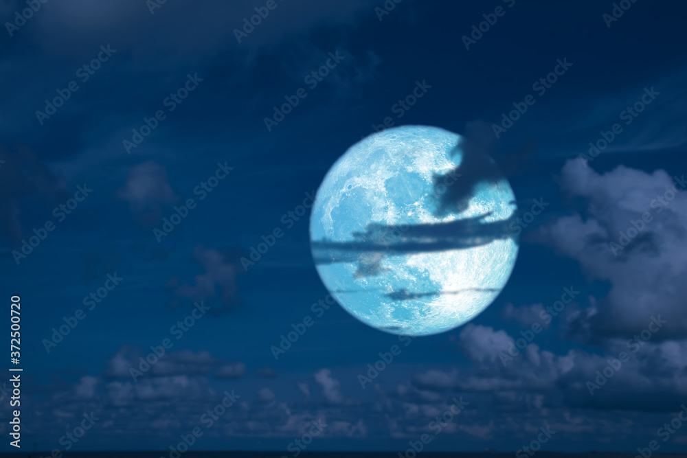 full corn moon  silhouette dark cloud on the night sky
