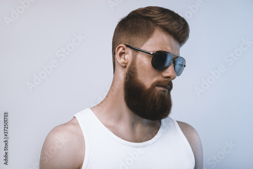 Bearded man wearing sunglasses