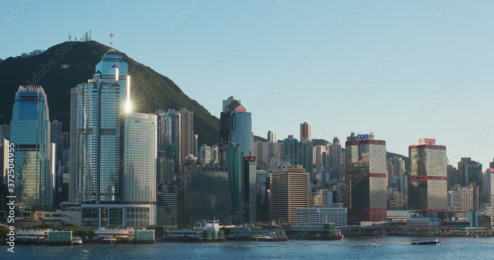 Naklejka premium Hong Kong city at sunset