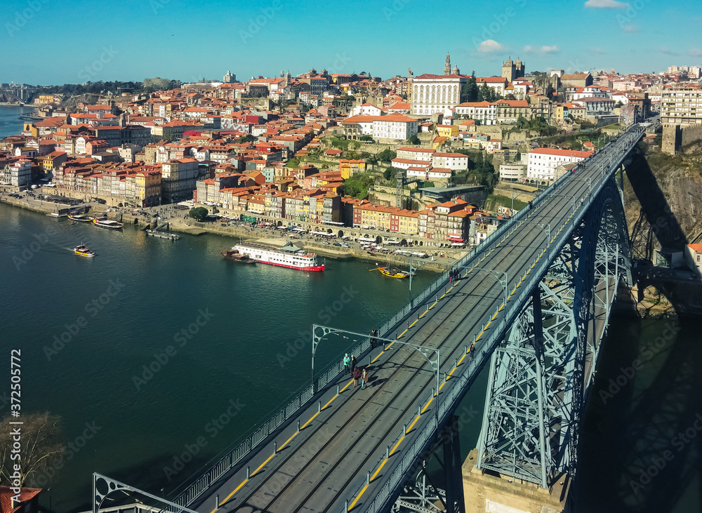 Panoramic view of the Douro River and the city of Porto in a sunny afternoon.