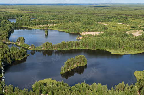 Forest lake from a height in the taiga