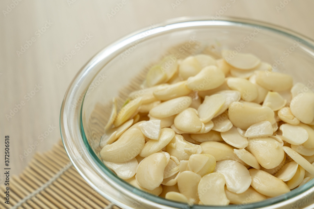 White beans after remove the skin in a glass bowl White beans after remove the skin in a glass bowl