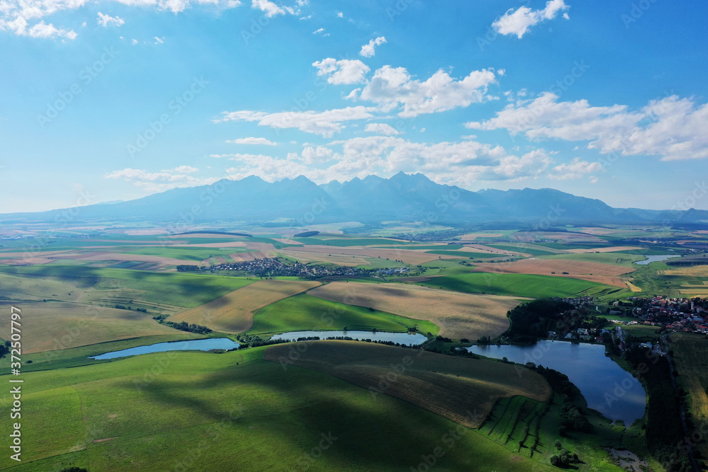 Fototapeta premium Aerial view of a pond in the village of Vrbov in Slovakia