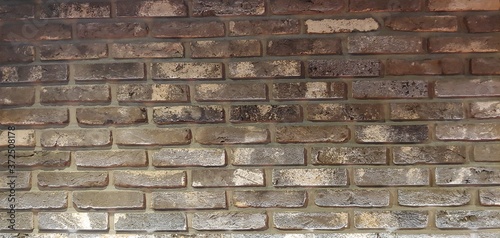 Brown-colored spotted block wall_background