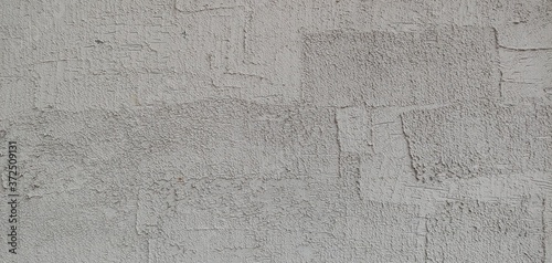 a grey wall with clear brush marks_background