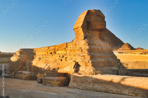 Greatest wonder of the world  the Egypt pyramids and the stone Sphinx on the Giza platou in endless sands of the Sahara desert