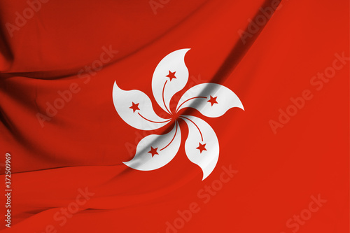 The flag of Hong Kong on fabric texture background. Flag image for design on flyers, advertising.