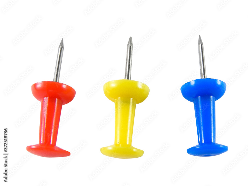 Multicolored push pins on awhite background close-up macro
Multicolored push pins on awhite background close-up macro